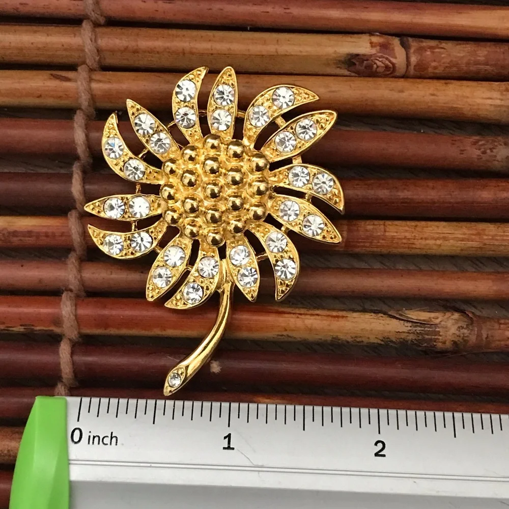 Napier Rhinestone Flower Brooch Gold Tone Signed